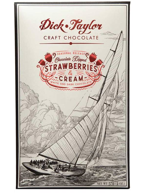 Chocolate dipped strawberries with cream from Dick Taylor Craft Chocolate, showcasing glossy chocolate coating on fresh strawberries.