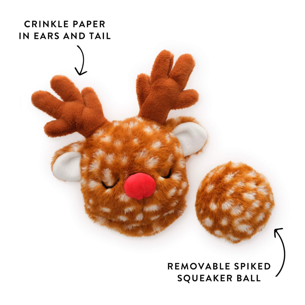 Plush reindeer dog toy with crinkle paper in ears and tail and removable spiky squeaker ball on a white background.