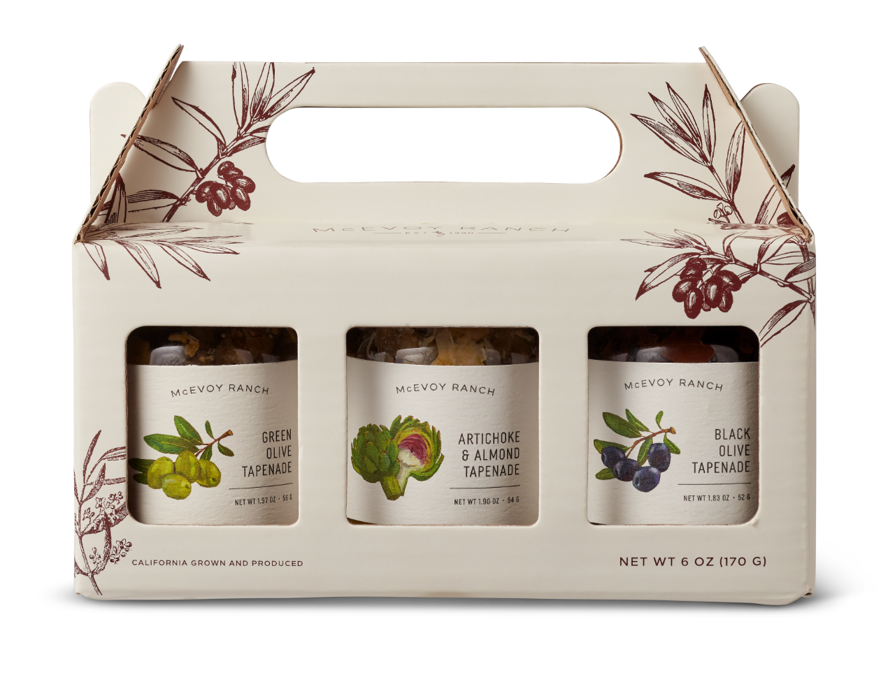 Mini Tapenade Gift Pack featuring assorted charcuterie tapenades from McEvoy Ranch on a wooden platter with crackers and fresh herbs.