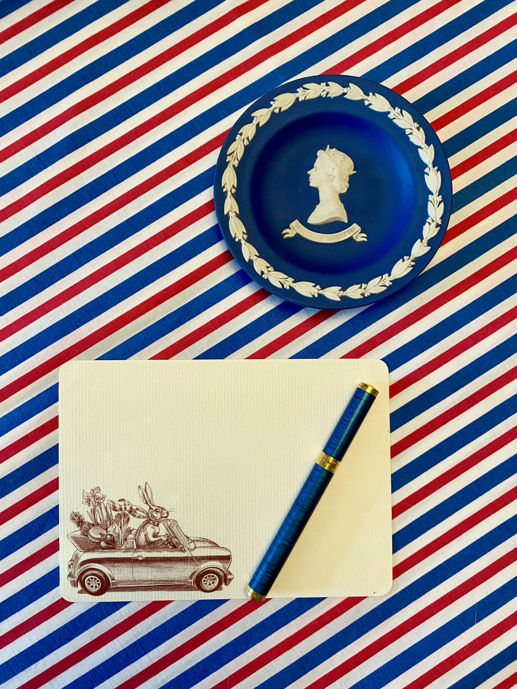 Alexa Pulitzer Rabbit Road Trip long paper pad with a colorful rabbit and road trip design, stacked with pages ready for writing.
