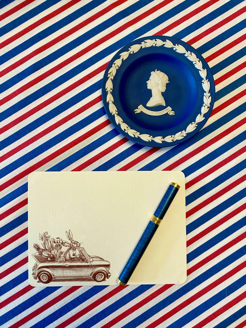 Alexa Pulitzer Rabbit Road Trip long paper pad with a colorful rabbit and road trip design, stacked with pages ready for writing.