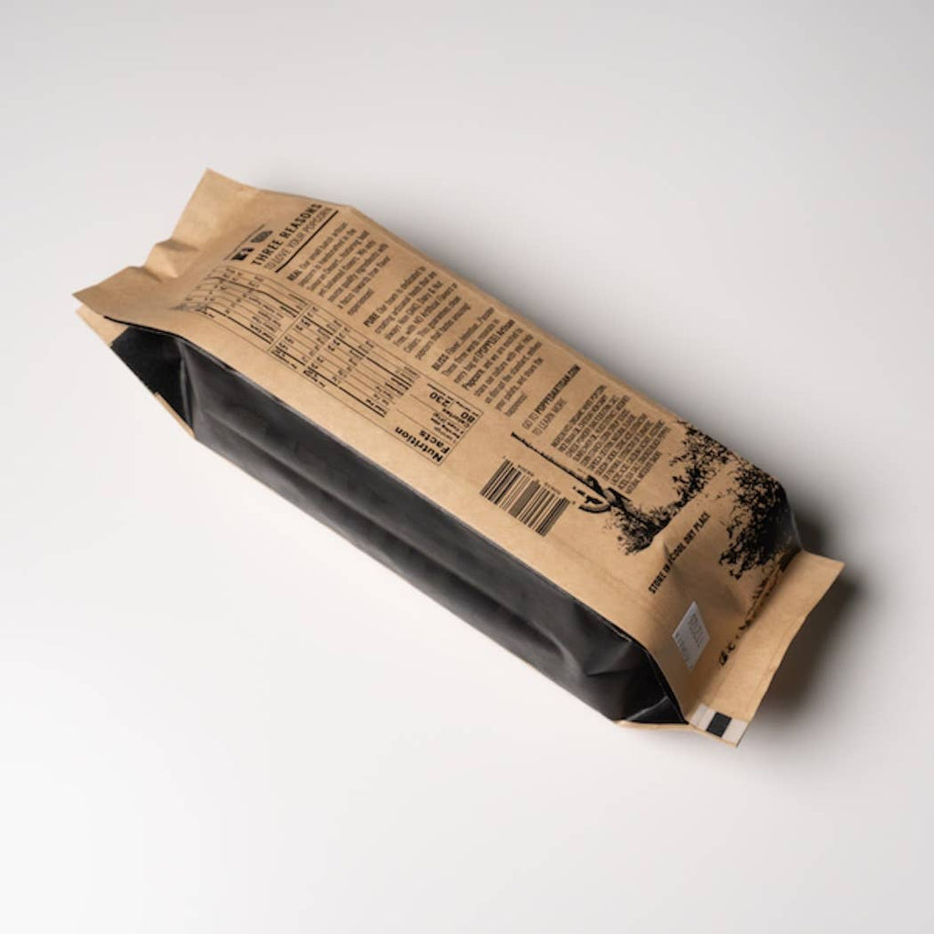 Kraft paper packaging with text and graphics on a white background