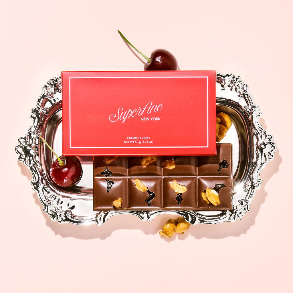 Superfine Chocolate Cherry Chunky Bar, rich chocolate and cherry-flavored candy with a textured, chunky appearance.