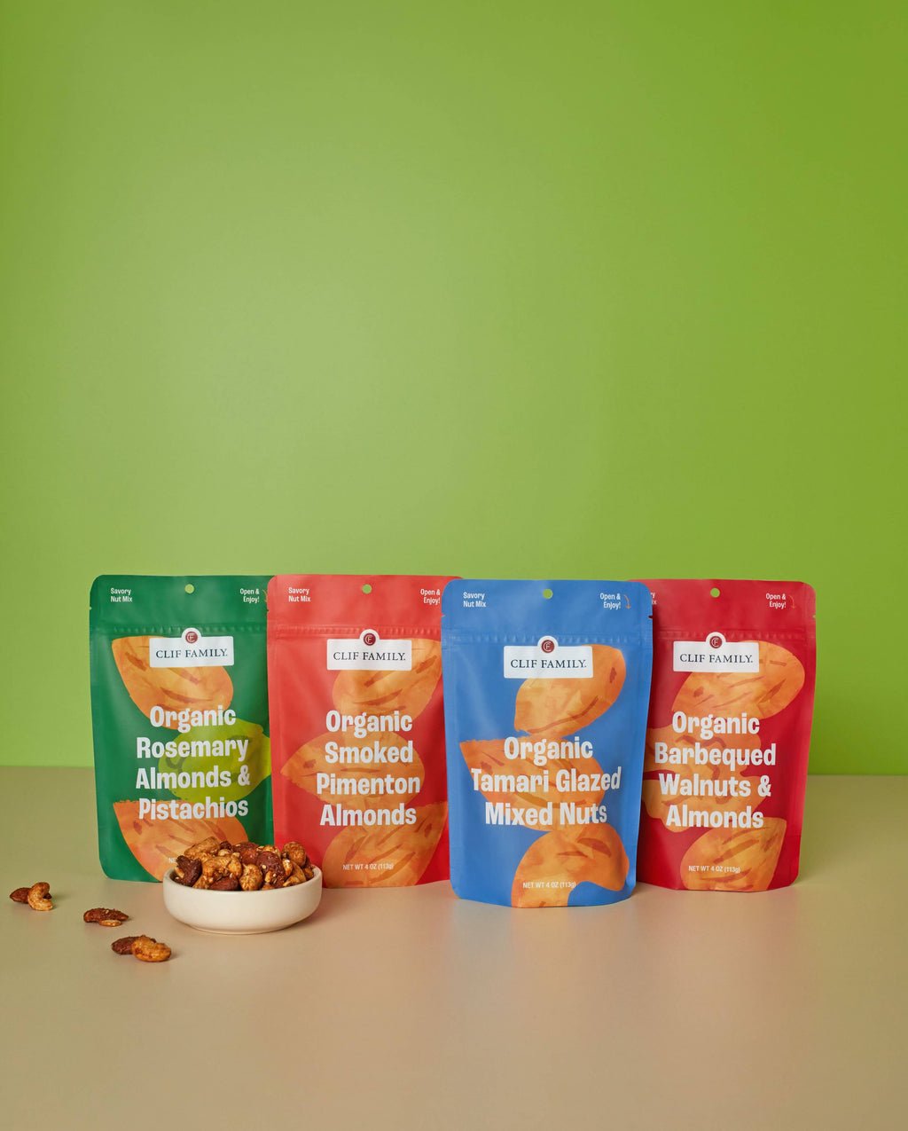 Clif Family Smoked Pimenton Almonds in a bowl, roasted almonds coated with smoky pimenton spice from Napa Valley, nuts snack.