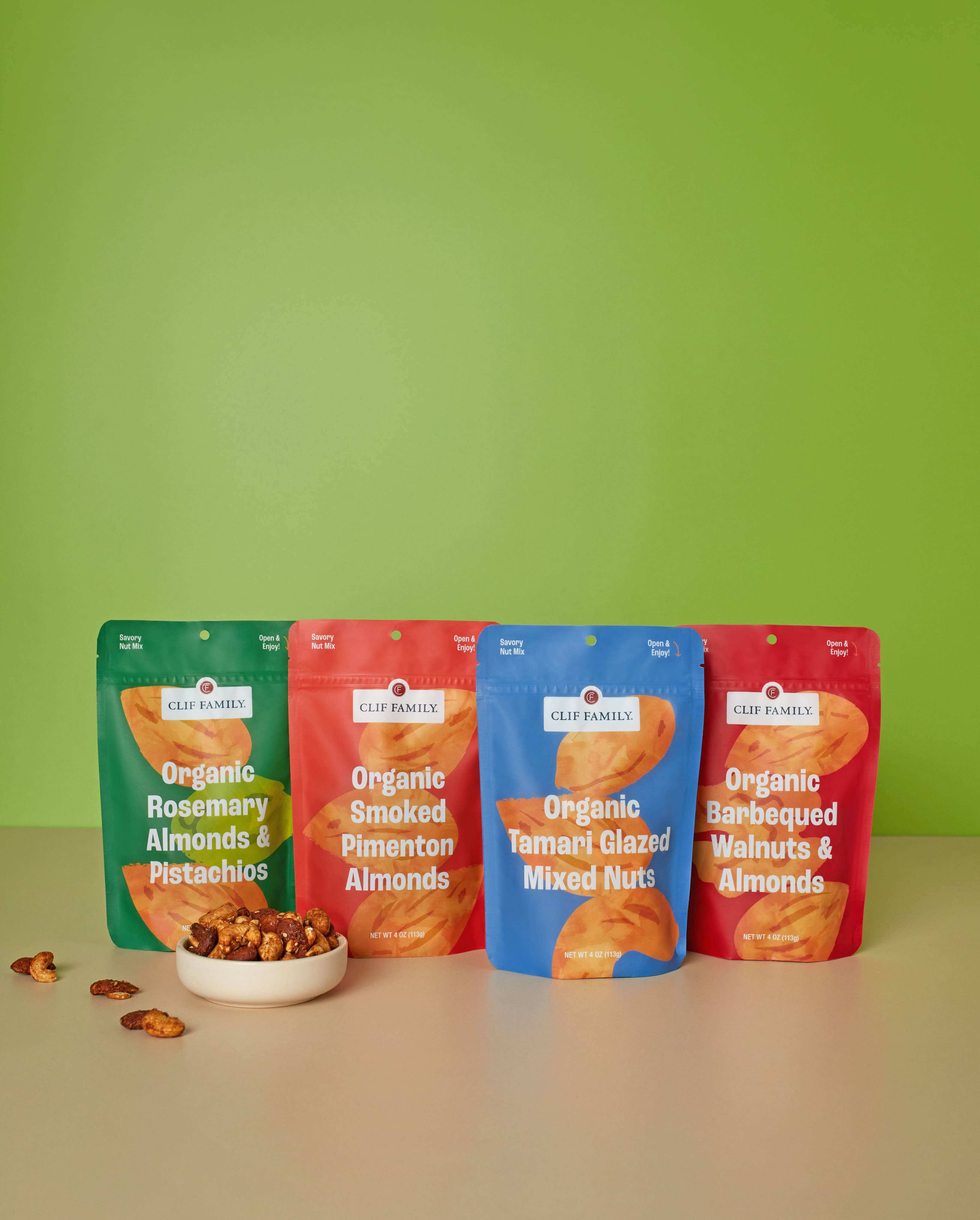 Clif Family Smoked Pimenton Almonds in a bowl, roasted almonds coated with smoky pimenton spice from Napa Valley, nuts snack.