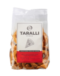 Oil & Vinegar pizza-flavored Taralli snacks in a clear bowl, showing the crunchy, ring-shaped Italian breadsticks with seasoning.