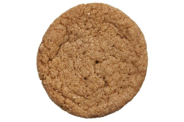 Bunches & Bunches Ginger Snaps cookies arranged on a plate, showcasing their crispy texture and spicy ginger flavor.